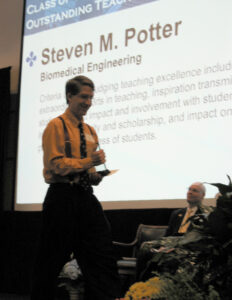 Potter receiving Ector Teaching Award